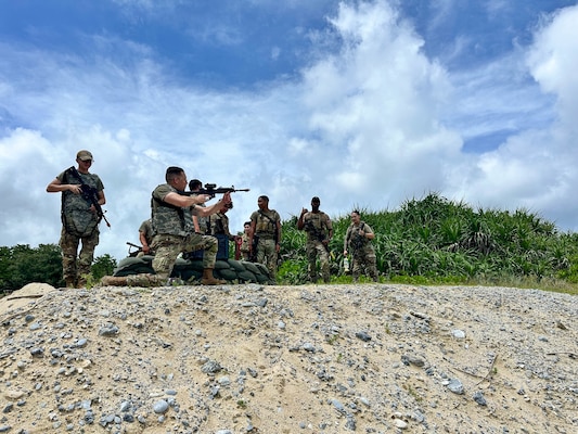 Service members doing perimeter patrol.