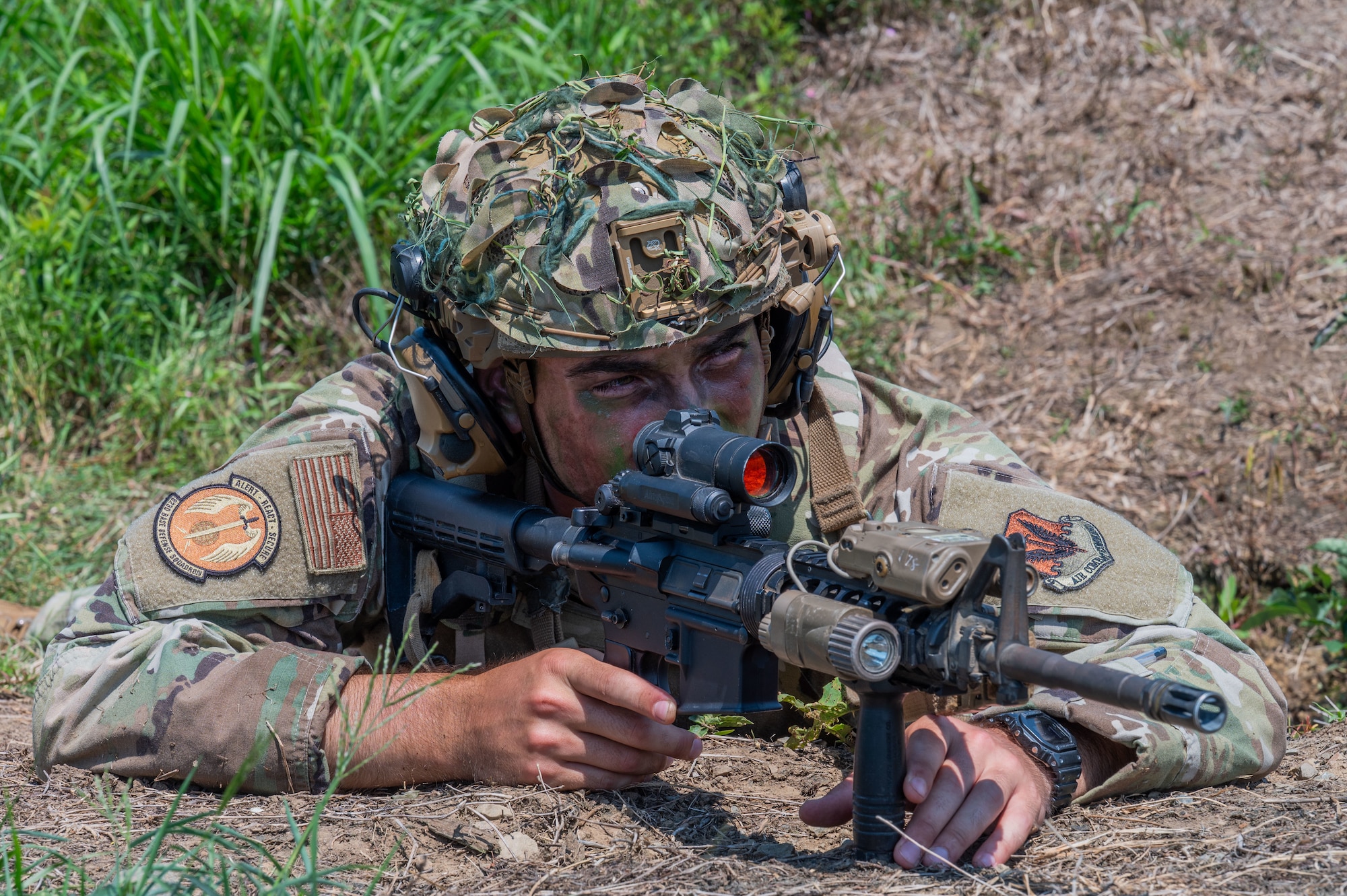 Airman lying on ground.