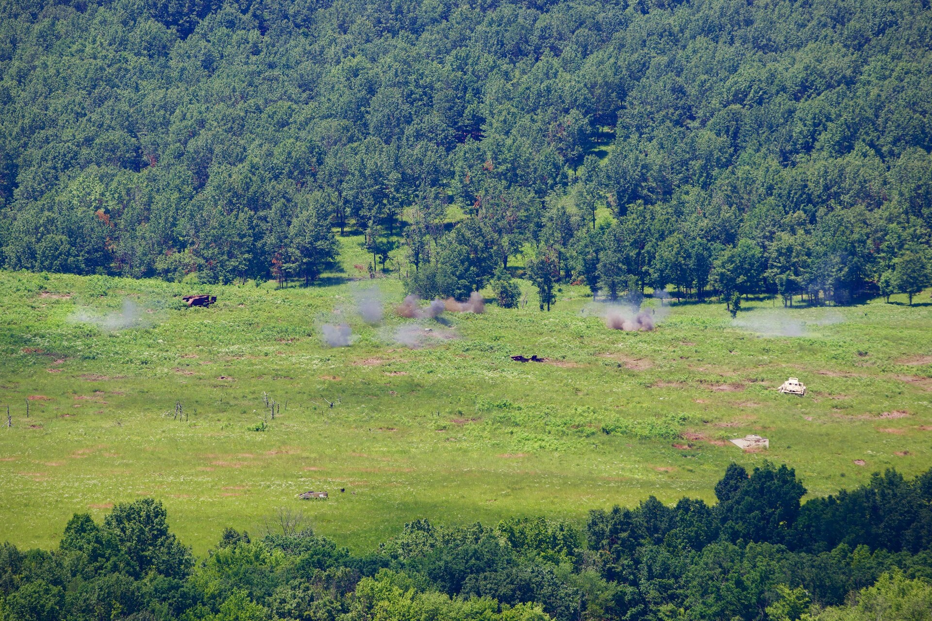 U.S. Soldiers with 1st Battalion, 109th Infantry Regiment, 2nd Infantry Brigade Combat Team, 28th Infantry Division operate an unmanned aerial system and call for artillery fire during a demonstration at Fort Indiantown Gap, Pennsylvania, July 28, 2025. The Soldiers and representatives from Carnegie Mellon University’s Software Engineering Institute demonstrated Project Shrike, an AI-enabled system for rapid target recognition and fire adjustment, by integrating drones and artillery during live-fire training. (U.S. Army National Guard photo by Maj. Travis Mueller)