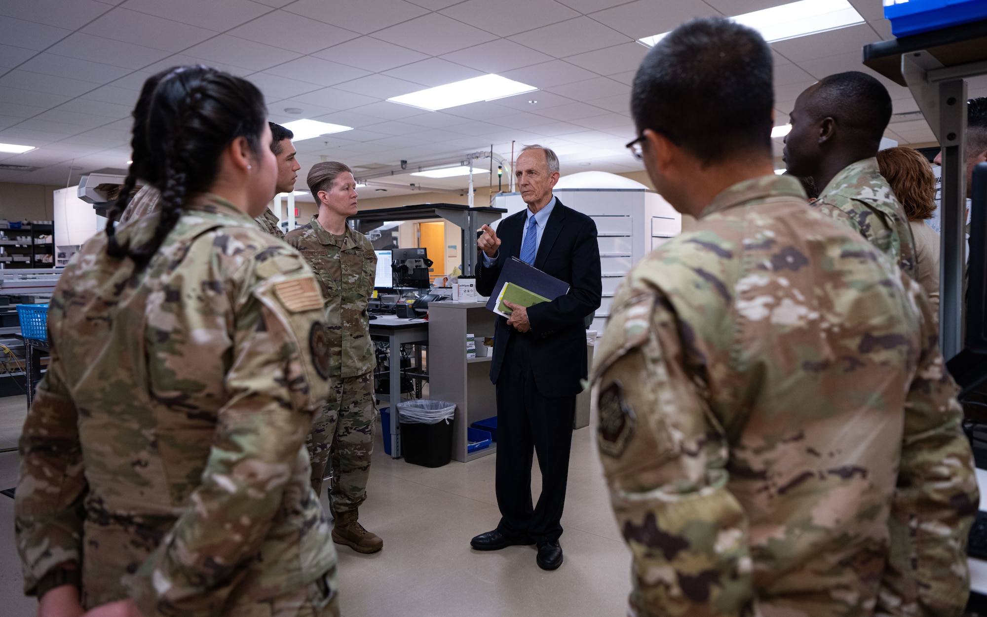 Dr. David J. Smith, Acting Director of the Defense Health Agency, tours the 6th Medical Group’s satellite drive-through pharmacy at MacDill Air Force Base, Florida, Aug. 6, 2025. Smith directs department-wide efforts to develop and implement policies and programs relating to deployment medicine, national disaster support, medical research and development, and medical readiness for 2.3 million service members. (U.S. Air Force photo by Airman 1st Class Helen Ly)