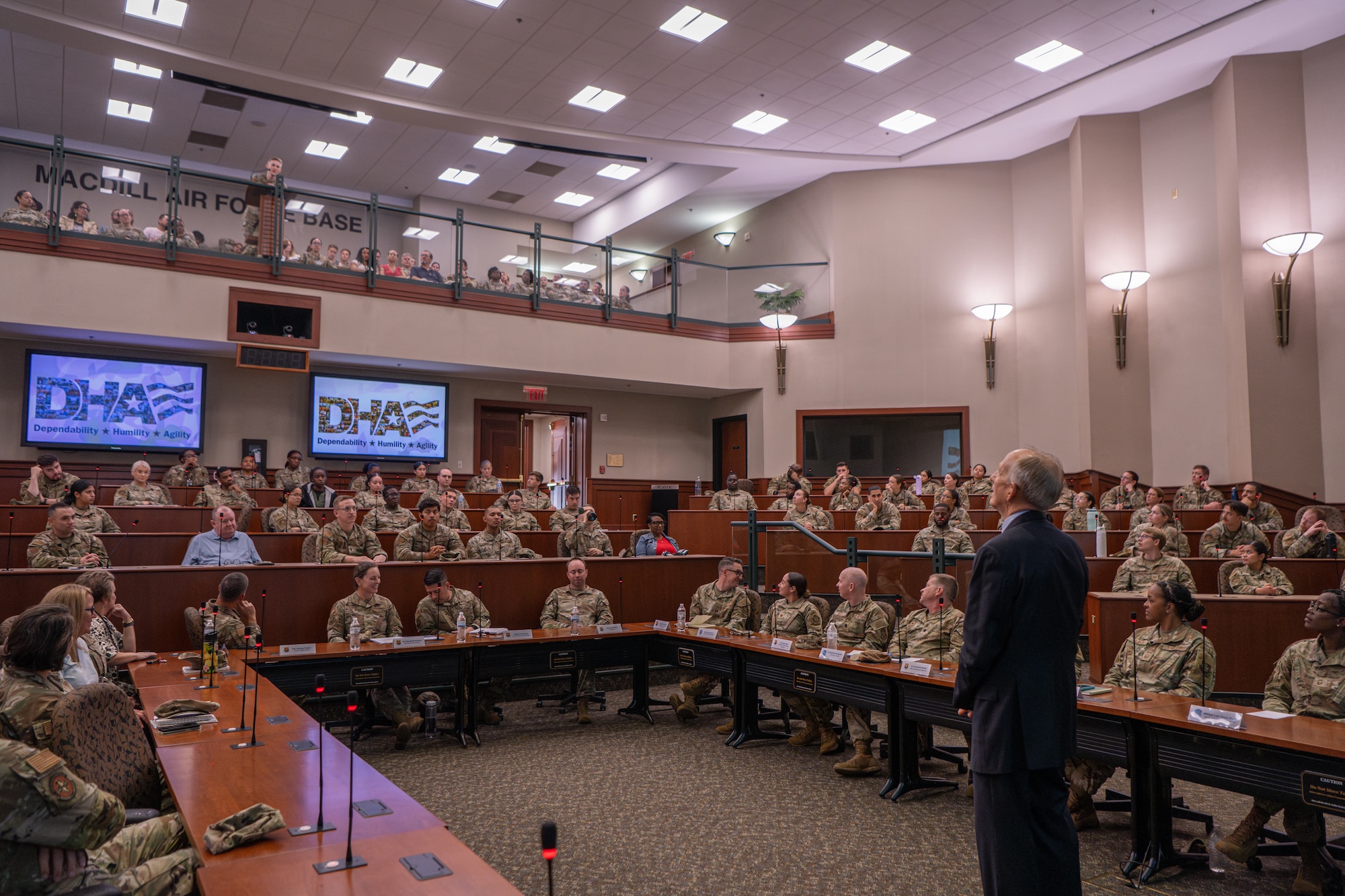 Dr. David J. Smith, Acting Director of the Defense Health Agency, conducts a town hall at the Davis Conference Center at MacDill Air Force Base, Florida, Aug. 6, 2025. Smith answered questions from members of the 6th Medical Group about upcoming policy changes and new health initiatives being implemented throughout the Department of Defense. (U.S. Air Force photo by Airman 1st Class Helen Ly)