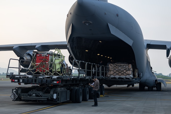 Cargo gets loaded onto a C-17 Globemaster III.