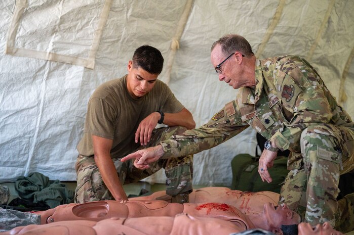 U.S. Air Force Airmen assigned to the 22nd Air Task Force, simulate responding to injuries due to a Tactical Ballistic Missile (TBM) strike as part of Exercise Northern Strike 25-2 at Battle Creek Air National Guard Base, Michigan, Aug. 8, 2025.