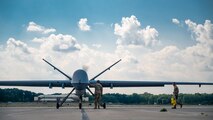 U.S. Airmen assigned to the 178th Attack Squadron receive an MQ-9 Reaper on the flight line during Exercise Northern Strike 25-2 (NS 25-2) at Battle Creek Air National Guard Base, Michigan, Aug. 8, 2025.