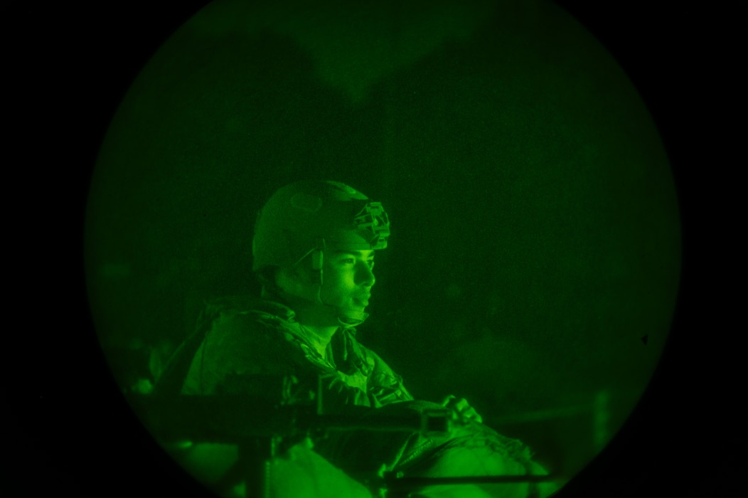 U.S. Air Force Airman 1st Class Joe Crimmins, 60th Civil Engineer Squadron HVAC technician, assigned to the 22nd Air Task Force, mans a defensive fighting position during night operations as part of Exercise Northern Strike 25-2 at Battle Creek Air National Guard Base, Michigan, Aug. 5, 2025.
