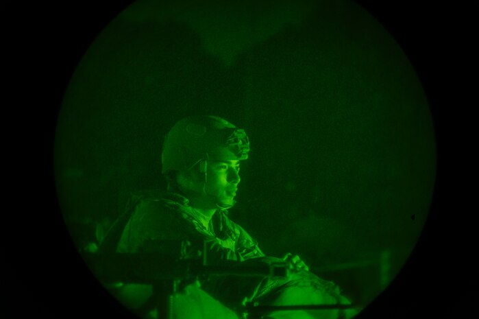 U.S. Air Force Airman 1st Class Joe Crimmins, 60th Civil Engineer Squadron HVAC technician, assigned to the 22nd Air Task Force, mans a defensive fighting position during night operations as part of Exercise Northern Strike 25-2 at Battle Creek Air National Guard Base, Michigan, Aug. 5, 2025.