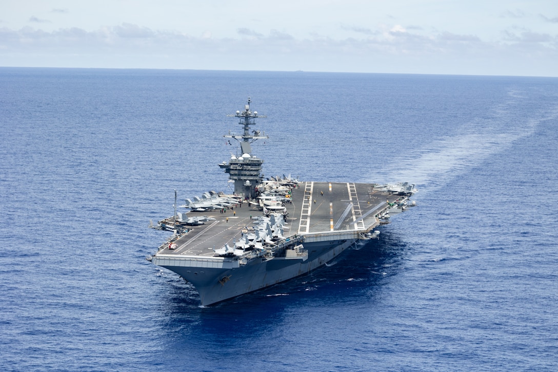 A U.S. Marine Corps MV-22B Osprey assigned to Marine Medium Tiltrotor Squadron (VMM) 265 (Rein.), 31st Marine Expeditionary Unit, departs the aircraft carrier USS George Washington (CVN 73) during anti-submarine warfare training, in the Philippine Sea, Aug. 8, 2025.