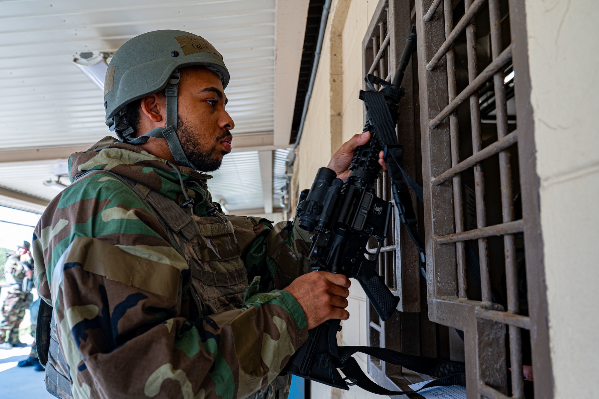 A man retrieves a gun.