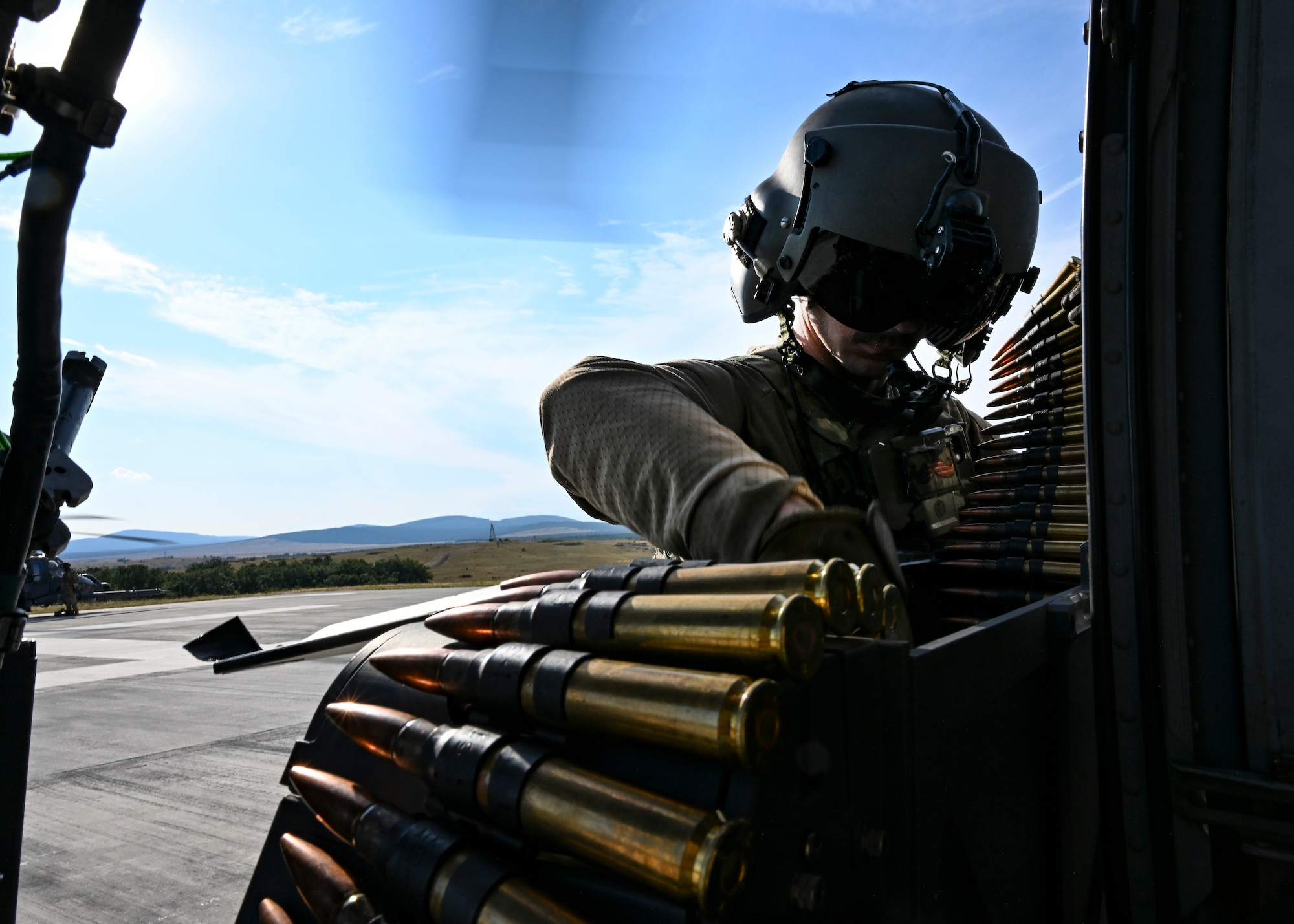 Special Mission Aviator reloads ammunition.