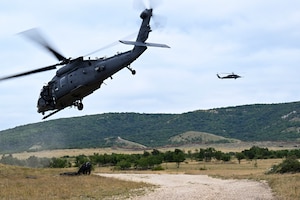 Two helicopters flying