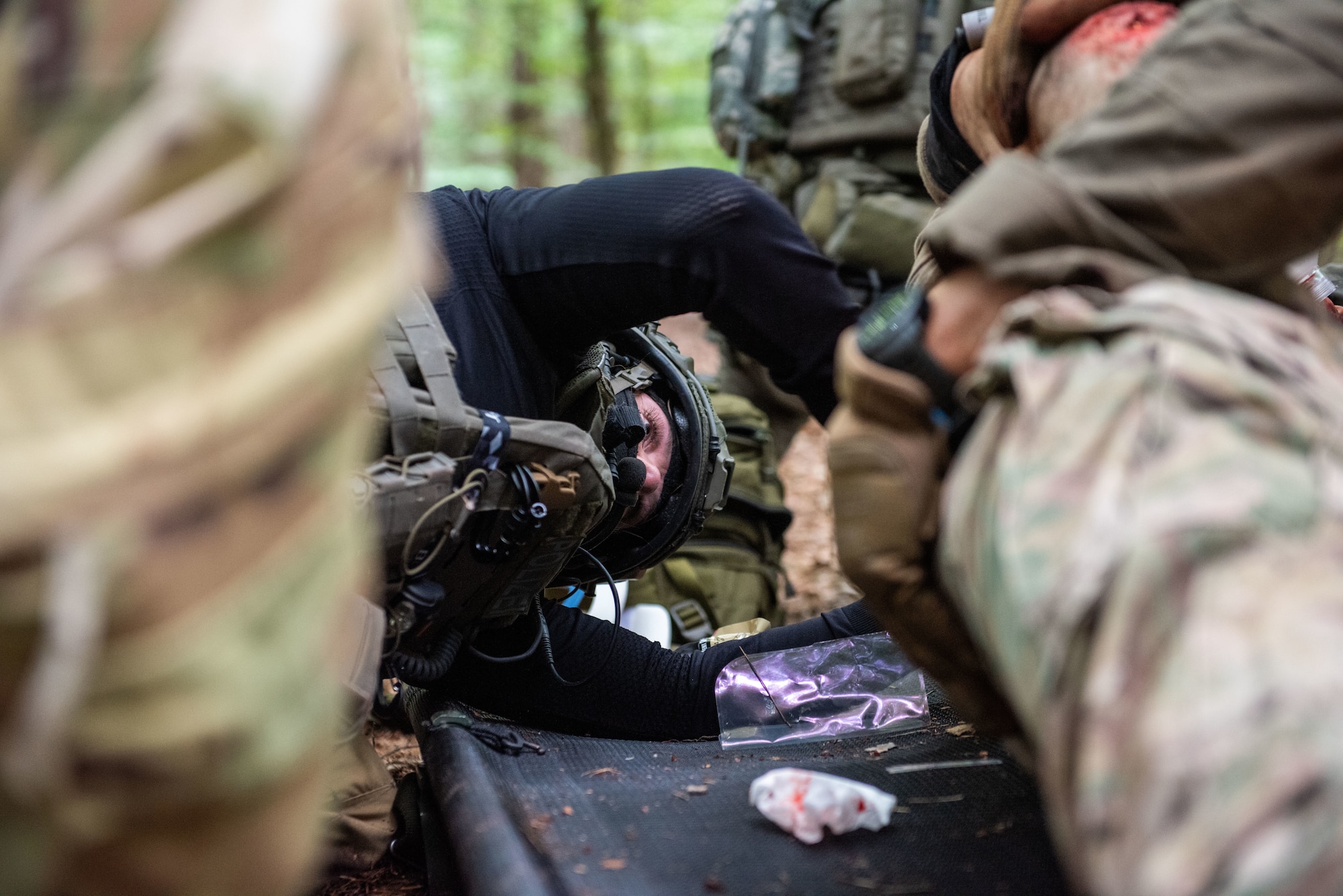 A German SWAT officer performs a blood sweep on a mannequin during Tactical Combat Casualty Care training at Landstuhl, Germany, July 31, 2025. The 86th Medical Group held its second iteration of Tactical Combat Casualty Care training for the officers, further strengthening the relationship between German police and the U.S. Air Force. (U.S. Air Force photo by Airman 1st Class Joseph Curzi)