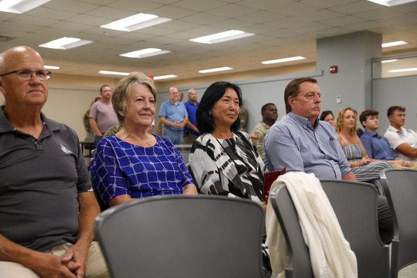 Family and friends watch as Lt. Col. Terry Durham is promoted to colonel Aug. 6, 2025, at the Bowman Field Readiness Center in Louisville, Kentucky.