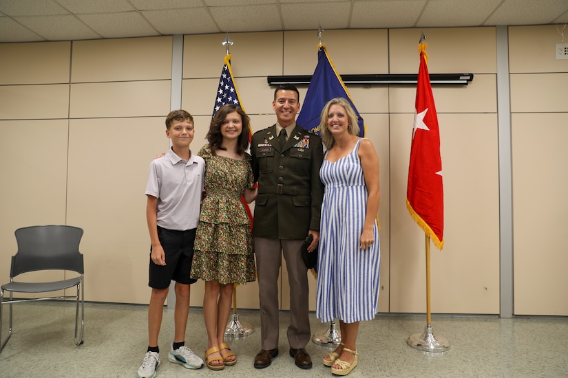 Lt. Col. Terry Durham poses with his family after his promotion to colonel Aug. 6, 2025, at the Bowman Field Readiness Center in Louisville, Kentucky.
