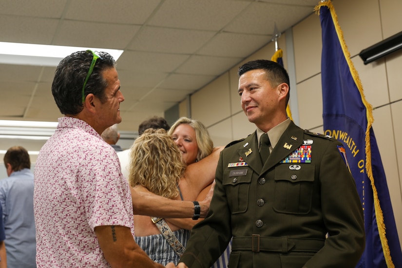 Lt. Col. Terry Durham is congratulated by family and friends after his promotion to colonel Aug. 6, 2025, at the Bowman Field Readiness Center in Louisville, Kentucky.