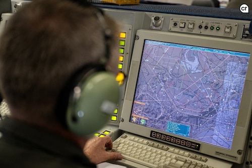 A NATO tactical director operates inside a NATO AWACS assigned to the NATO Airborne Early Warning & Control Force during Exercise Anatolian Eagle 25 near the 3rd Main Jet Base, Konya, Türkiye, June 27, 2025. ABMs use advanced technologies to achieve the agility and resilience required in today's dynamic operational environment. (U.S. Air Force photo by Airman 1st Class Zachary Jakel)