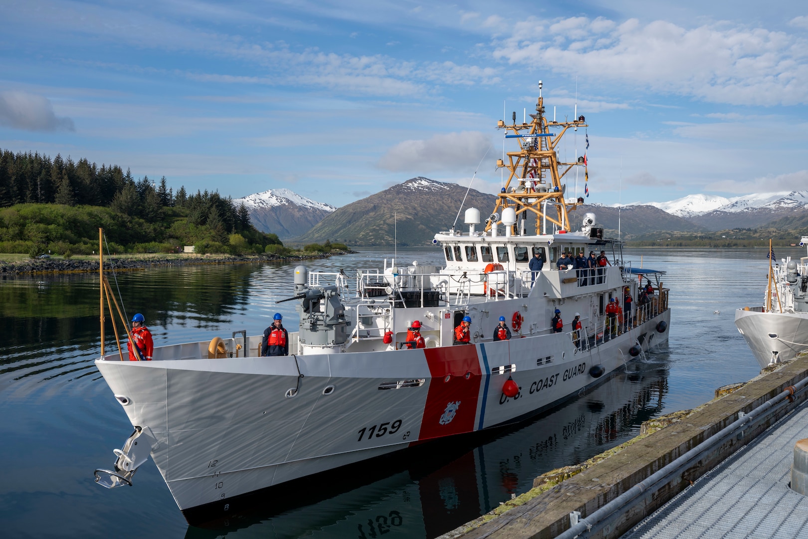 The crew of U.S. Coast Guard Cutter Earl Cunningham (WPC 1159) arrives to their homeport in Kodiak, Alaska, May 31, 2025. This was the first time the cutter had arrived to its homeport following its construction in Lockport, Louisiana. (U.S. Coast Guard photo by Petty Officer 1st Class Shannon Kearney)