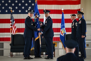 Airmen participate in a change of command ceremony.