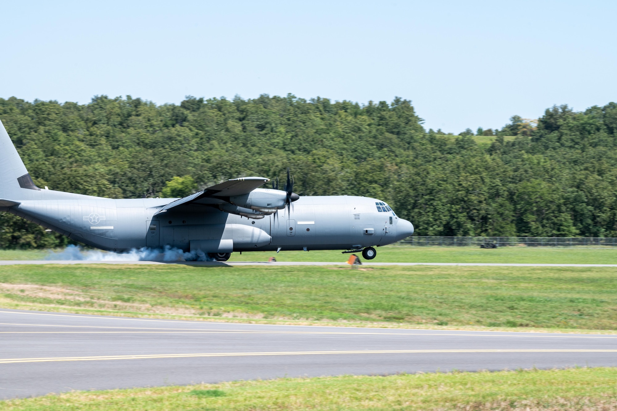A U.S. Air Force C-130J Super Hercules assigned to the 61st Airlift Squadron lands during exercise Bamboo Eagle 25-3 at Camp Robinson, Arkansas, August 4, 2025. Landing zone operations are a key component of Agile Combat Employment, enabling dispersed and resilient force projection. (U.S. Air Force photo by Airman 1st Class Adrien Tran)