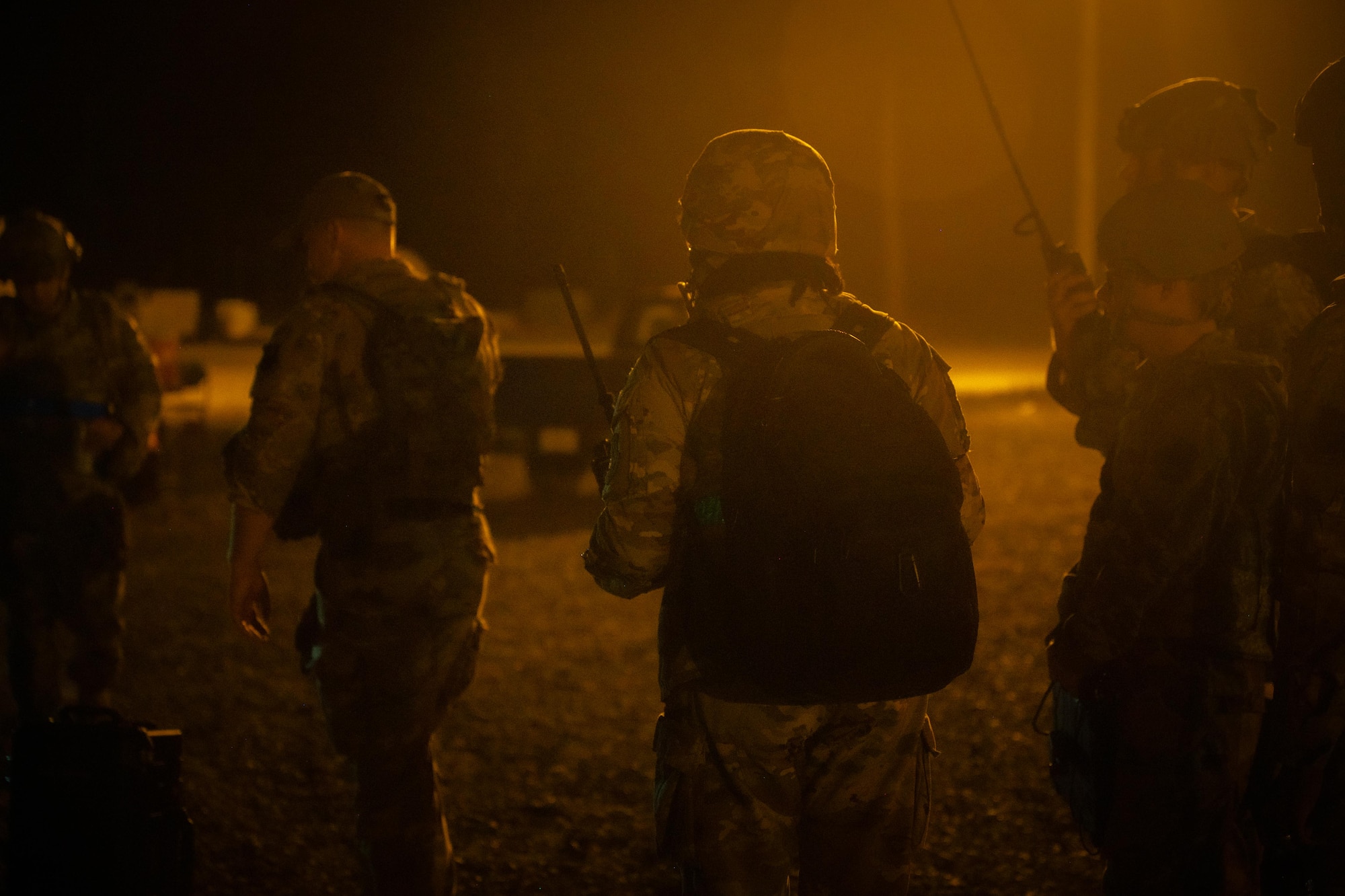 U.S. Air Force Airmen assigned to the 21st Air Task Force relocate to the forward wing operating center during exercise Bamboo Eagle 25-3 at Camp Robinson, Arkansas, Aug. 8, 2025. Airmen moved equipment from the mobile operating base to the forward operating center after receiving a simulated long-range missile threat. (U.S. Air Force photo by Airman 1st Class Adrien Tran)