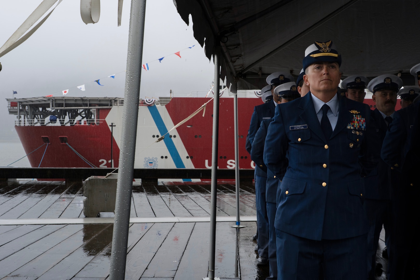 The crew of U.S. Coast Guard Cutter (WAGB 21) stand in formation during the Storis commissioning ceremony at Juneau, Alaska, August 10, 2025. Storis is the first polar icebreaker acquired in more than 25 years by the Coast Guard with its mission to assure access to the polar regions and protect U.S. sovereignty. (U.S. Coast Guard photo by Petty Officer 3rd Class Carmen Caver)