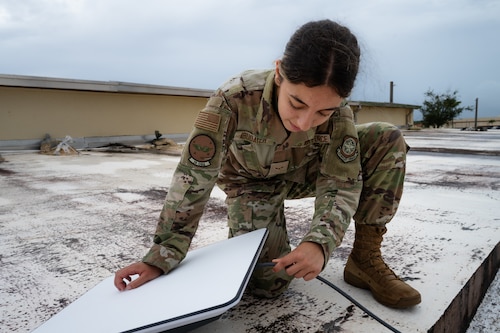 U.S. Air Force Airman 1st Class Hannah Abudayeh, 19th Operations Support Squadron all source intelligence analyst out of Little Rock Air Force Base, installs a satellite communication device at Andersen AFB, Guam, during the U.S. Air Force’s 2025 Department-Level Exercise series, July 26, 2025. The DLE is a new way of conducting operations in a contested, dynamic environment to build capabilities making a stronger, deterrent force. The DLE series encompasses all branches of the Department of Defense, along with Allies and partners, employing more than 400 Joint and coalition aircraft and more than 12,000 members at more than 50 locations across 3,000 miles. (U.S. Air Force photo by Senior Airman Jade M. Caldwell)