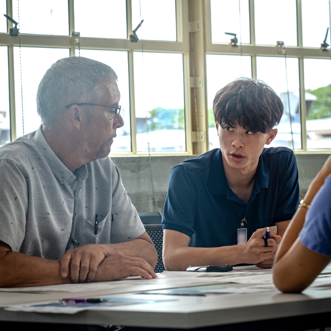 Russell Risch, an engineer at Pearl Harbor Naval Shipyard and Maintenance Facility discusses design concepts with Junior Engineers, Summer STEM Experience (JESSE) intern Ethan Chow during a group activity in the iLab, June 12, 2025.