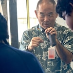 Sy Shimabukuro, an engineer at Pearl Harbor Naval Shipyard and Maintenance Facility explains troubleshooting principles to interns from the Junior Engineers Summer STEM Experience (JESSE) program during a hands-on workshop in the iLab, June 12, 2025.