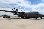 C-130 sits on the flightline and tests a system