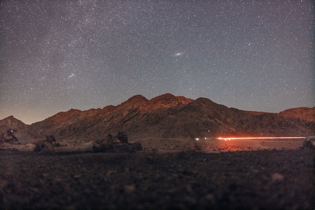 U.S. Marines with 3rd Battalion, 1st Marine Regiment, 1st Marine Division, conduct company attacks as part of Service Level Training Exercise 4-25 at Range 400, Marine Corps Air Ground Combat Center, Twentynine Palms, California, July 30, 2025. MCAGCC serves as the Marine Corps’ premier training venue for service-level exercises by providing realistic multi-domain environments to prepare forces for success in future conflicts. (U.S. Marine Corps photo by Lance Cpl. Micah Thompson)