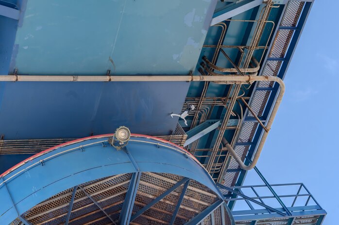 A Skydio X10D drone conducts a visual inspection beneath the catwalk of a crane structure at Pearl Harbor Naval Shipyard & Intermediate Maintenance Facility, Hawaii, June 18, 2025.