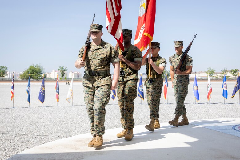 U.S. Marines with U.S. Marine Corps Forces Korea, retire the colors during a change of command ceremony at U.S. Army Garrison Humphreys, South Korea, June 5, 2025. The ceremony represented the official passing of authority from the outgoing commander, Maj. Gen. William E. Souza III, to the incoming commander, Maj. Gen. Valerie A. Jackson. MARFORK is the U.S. Marine Corps service component for United States Forces Korea and United Nations Command. (U.S. Marine Corps photo by Cpl. Nikolas Mascroft)
