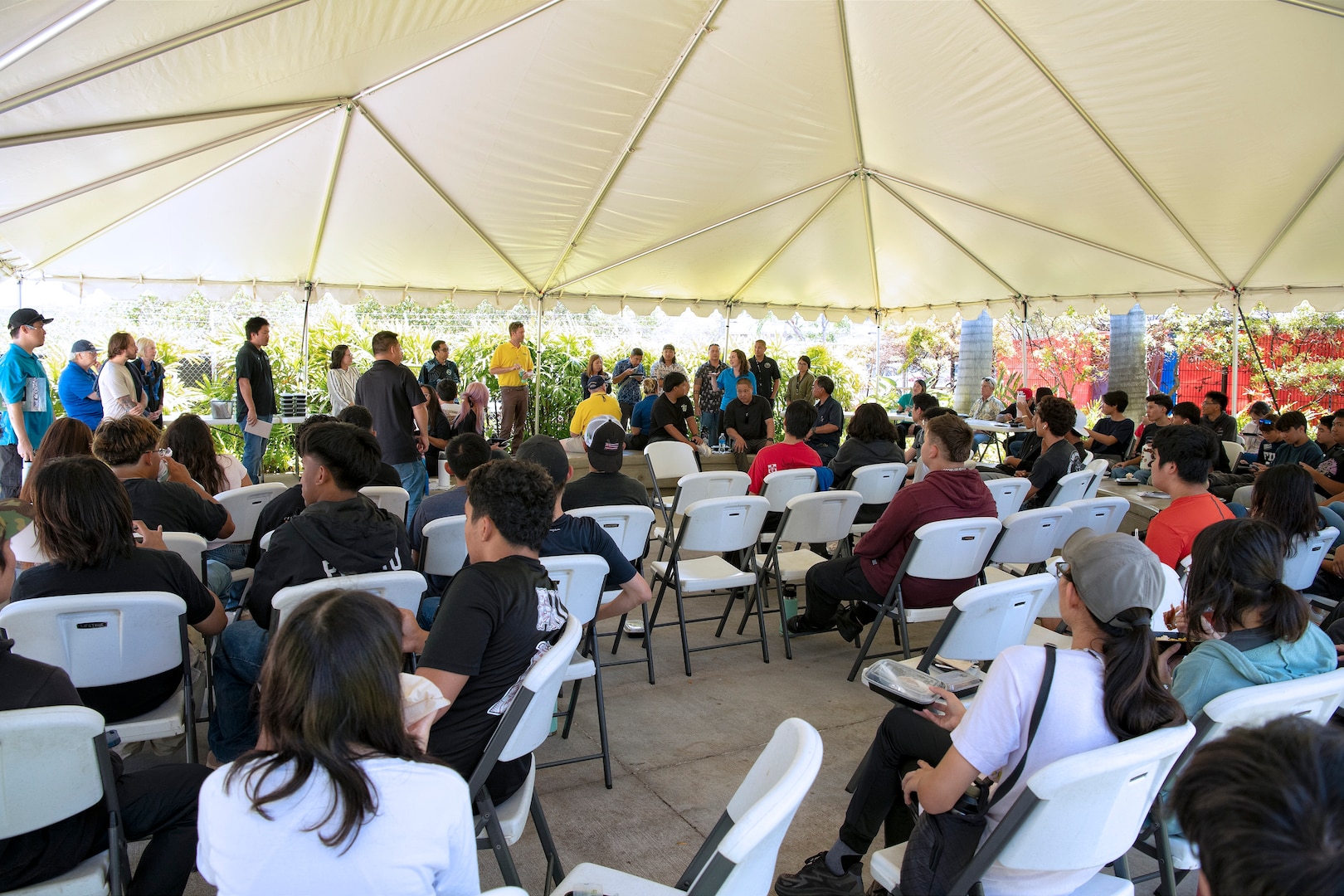 Volunteers from Pearl Harbor Naval Shipyard and Intermediate Maintenance Facility, Honolulu Community College and the submarine museum gather for a question-and-answer session with HCC CTE Academy students after the PHNSY mini-career fair at the Pacific Fleet Submarine Museum, July 15, 2025.