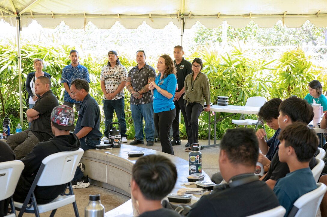 Julia Cramer, STEM Program coordinator with Pearl Harbor Naval Shipyard and Intermediate Maintenance Facility, opens with the question-and-answer session with Honolulu Community College CTE Academy students after the PHNSY mini-career fair at the Pacific Fleet Submarine Museum, July 15, 2025.