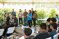 Julia Cramer, STEM Program coordinator with Pearl Harbor Naval Shipyard and Intermediate Maintenance Facility, opens with the question-and-answer session with Honolulu Community College CTE Academy students after the PHNSY mini-career fair at the Pacific Fleet Submarine Museum, July 15, 2025.