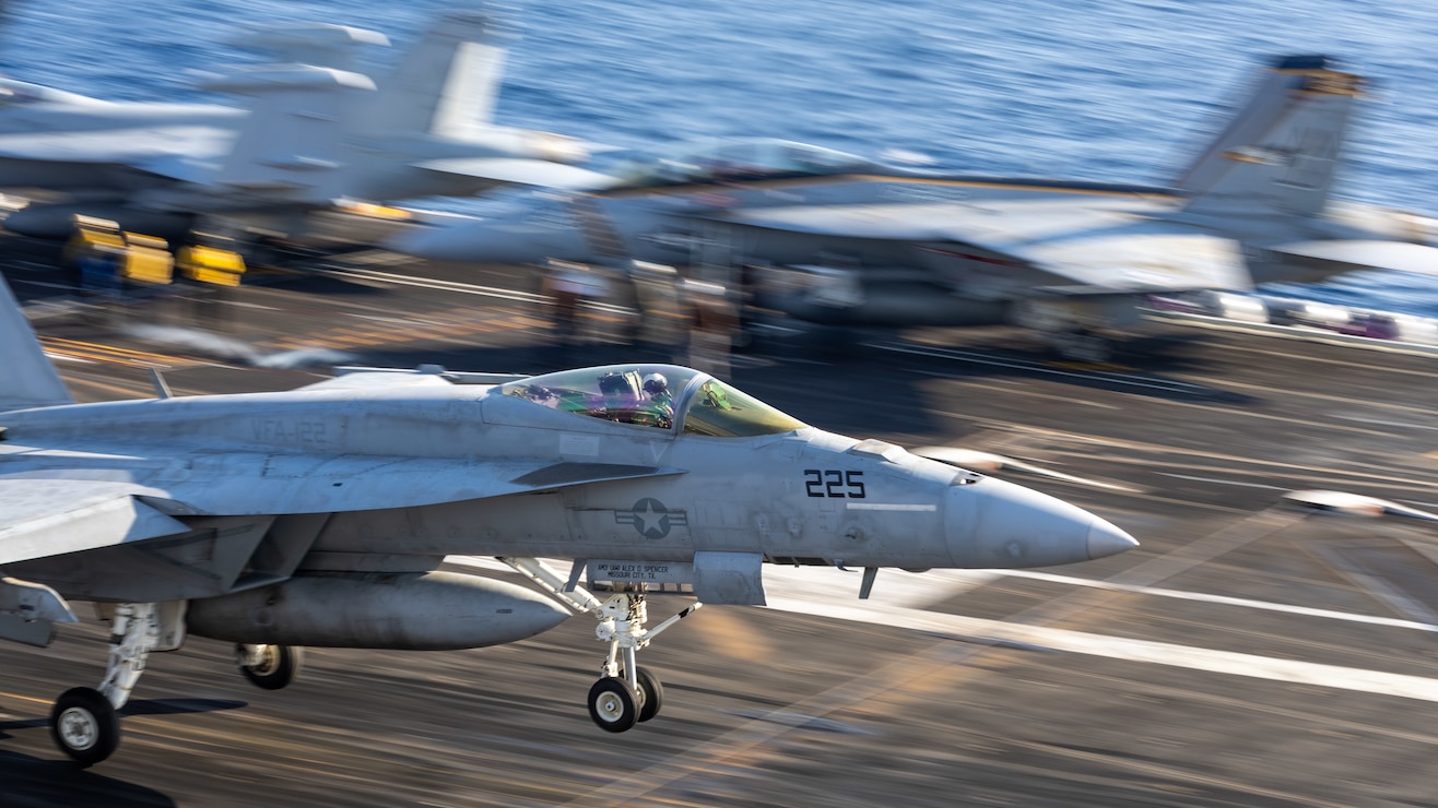 A U.S. Navy F/A-18F Hornet, assigned to the “Flying Eagles” of Strike Fighter Squadron 122, lands on the flight deck of the Nimitz-class aircraft carrier USS Theodore Roosevelt (CVN 71), Aug. 7, 2025.