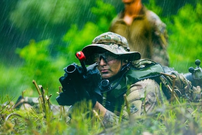 SOUTH KOREA (Aug. 6, 2025) — A Soldier from Brutal Company takes a defensive position during a blank-fire squad attack at Rodriguez Live Fire Complex, South Korea on Aug. 6, 2025.