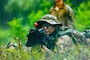 A Soldier from Brutal Company takes a defensive position during a blank-fire squad attack at Rodriguez Live Fire Complex, South Korea on Aug. 6, 2025.