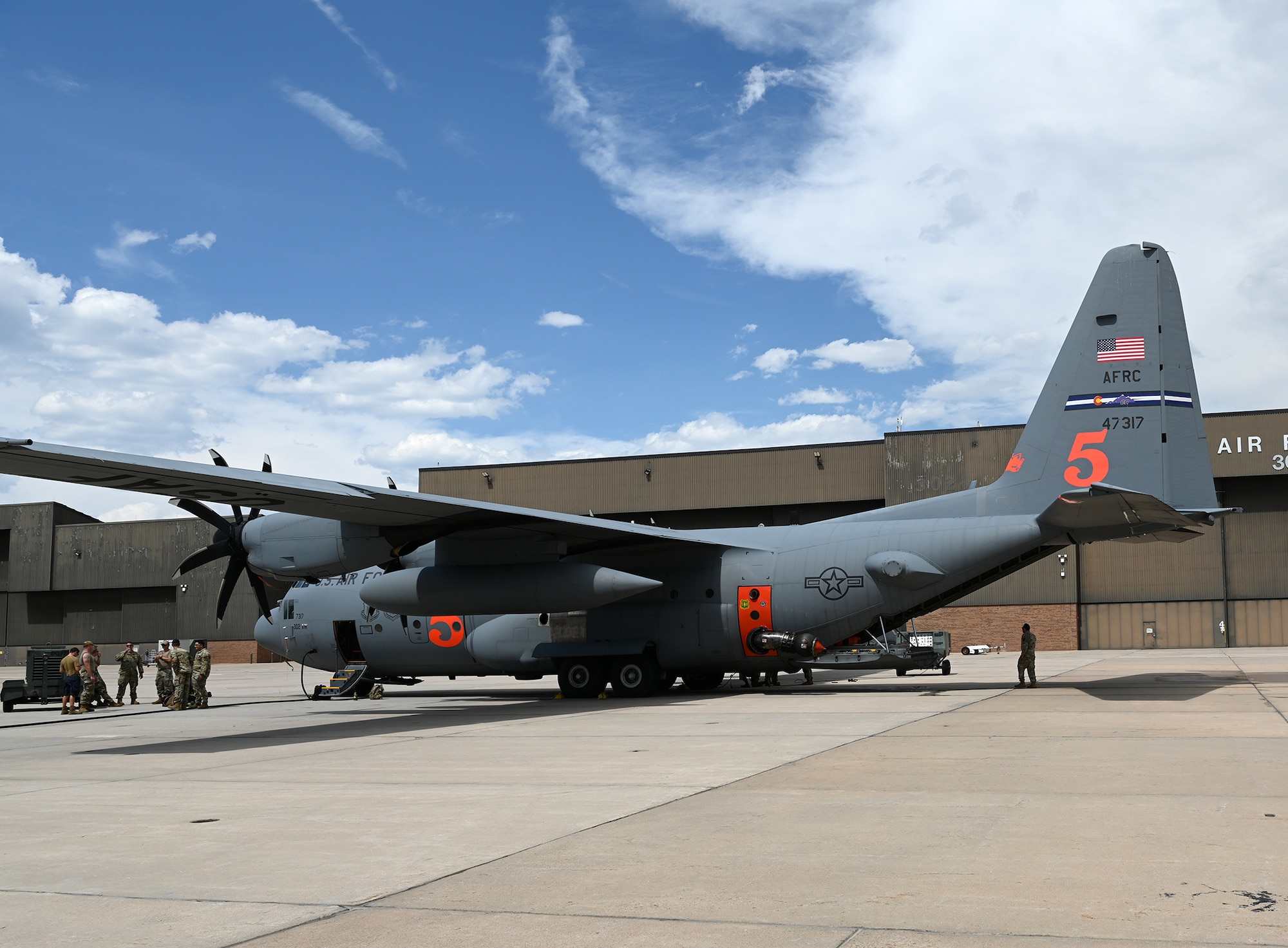 C-130 Hercules sits on the flightline