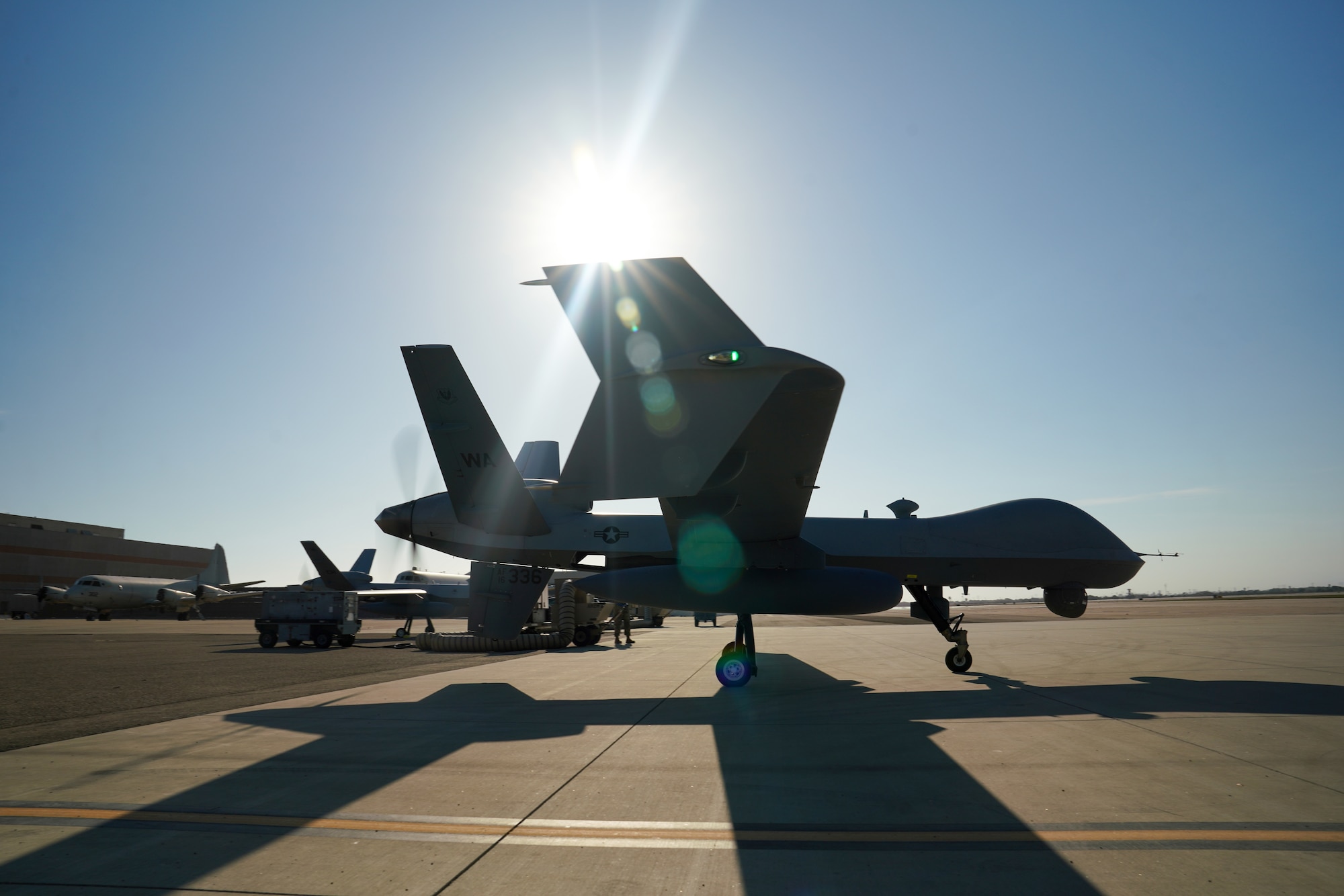An MQ-9 Reaper remotely piloted aircraft sits parked.