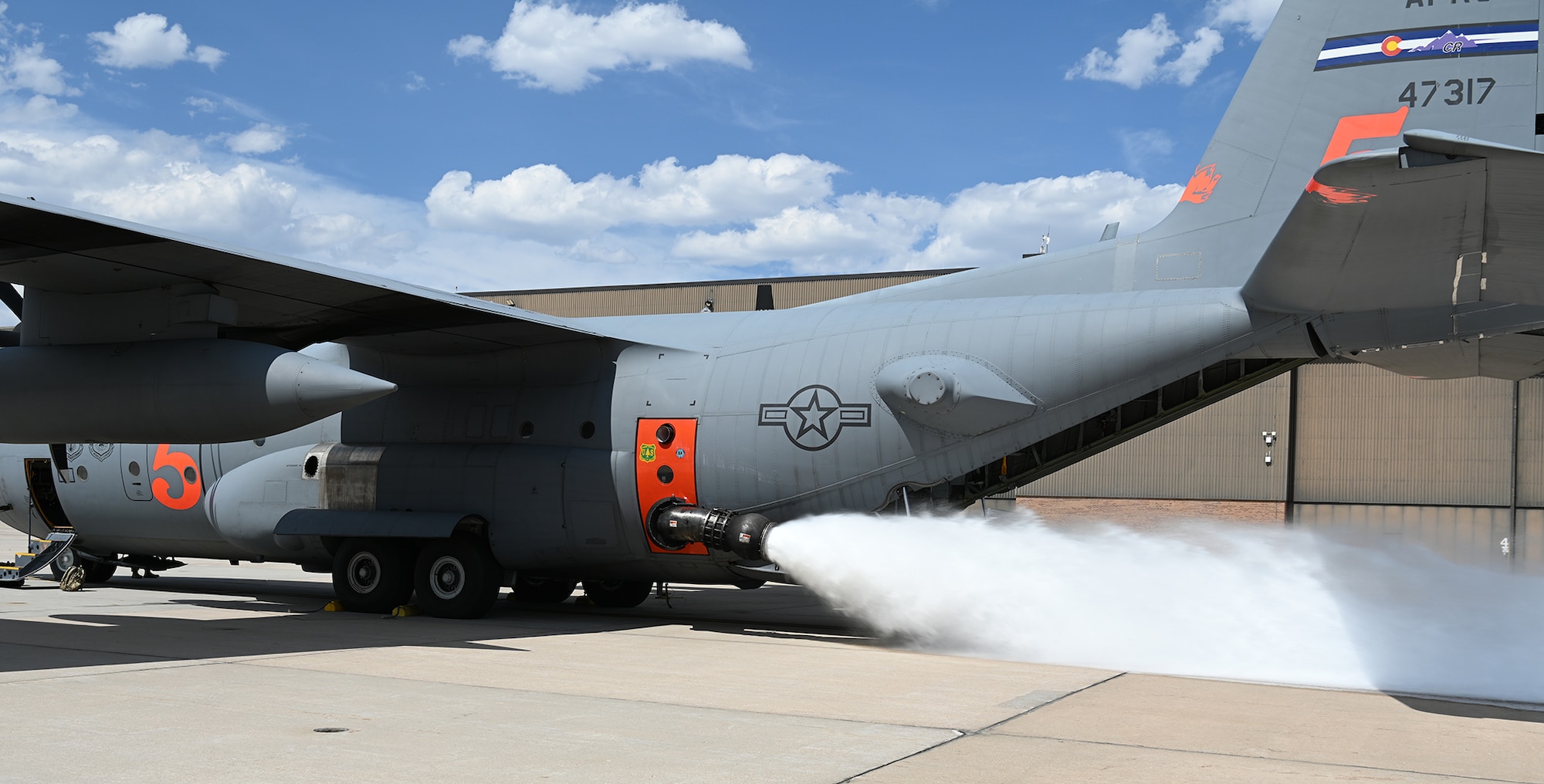 C-130 sits on the flightline and tests a system