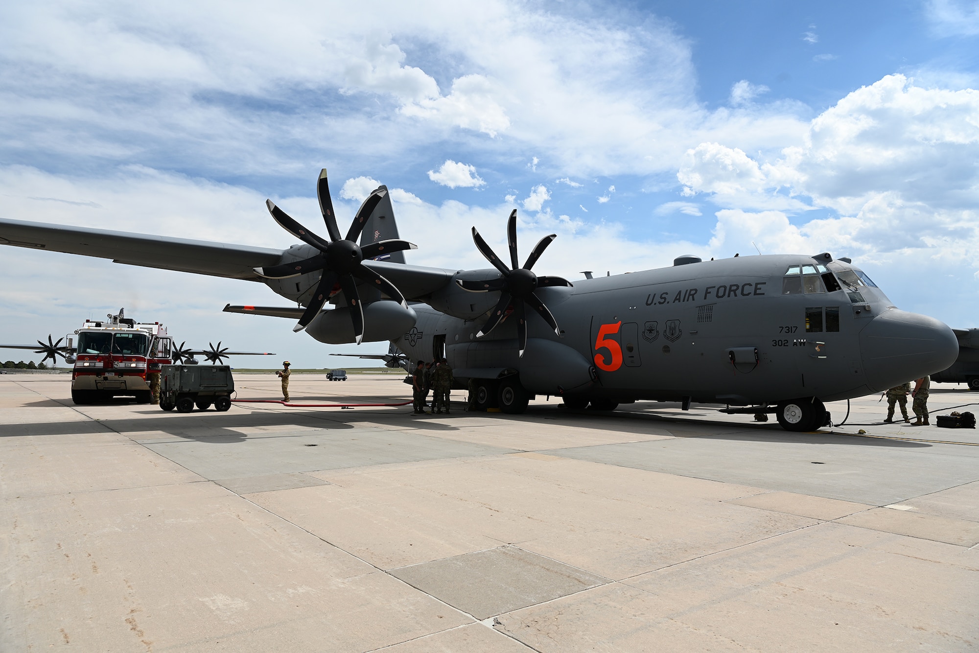 C-130 sits on the flightline and tests a system