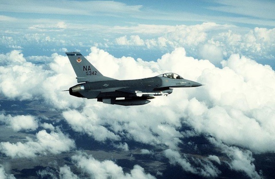 F-16 Tail #342 from the 428th Tactical Fighter Squadron carrying an AIM-9 Sidewinder missile and a Mark 82 bomb participates in 1981’s Exercise Cope Elite.