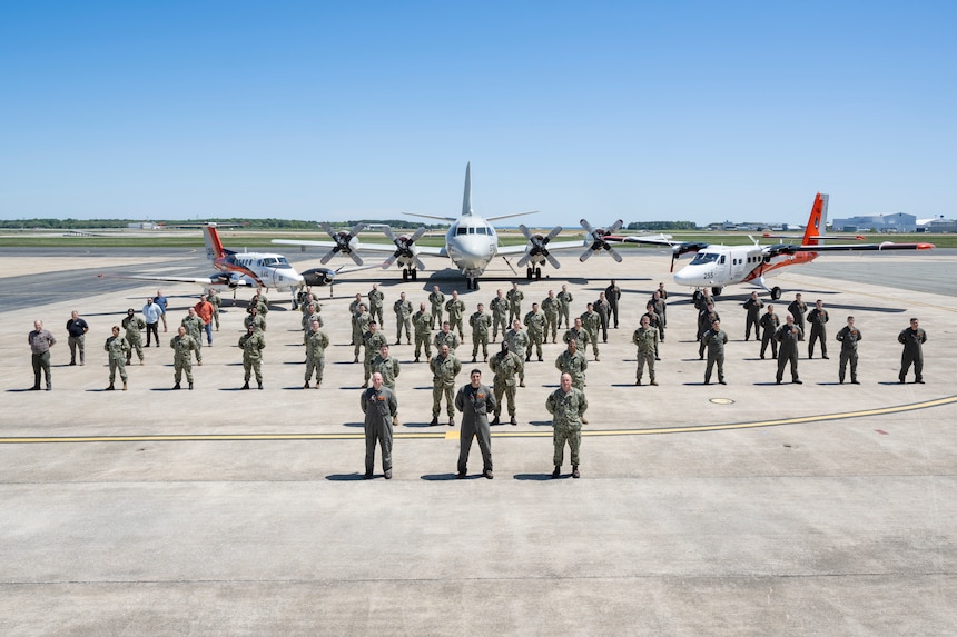 The U.S. Naval Research Laboratory’s Scientific Development Squadron (VXS) 1 gathers for a group photo at the Naval Air Station Patuxent River in Patuxent River, Md. April 28, 2025. VXS-1 conducts airborne scientific experimentation and advanced technology development in worldwide operations supporting U.S. Navy and national science and technology priorities and war fighting goals.