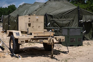A generator provides power for light sources and air conditioning units during the Warrior Exercise at Joint Base McGuire-Dix-Lakehurst, N.J.