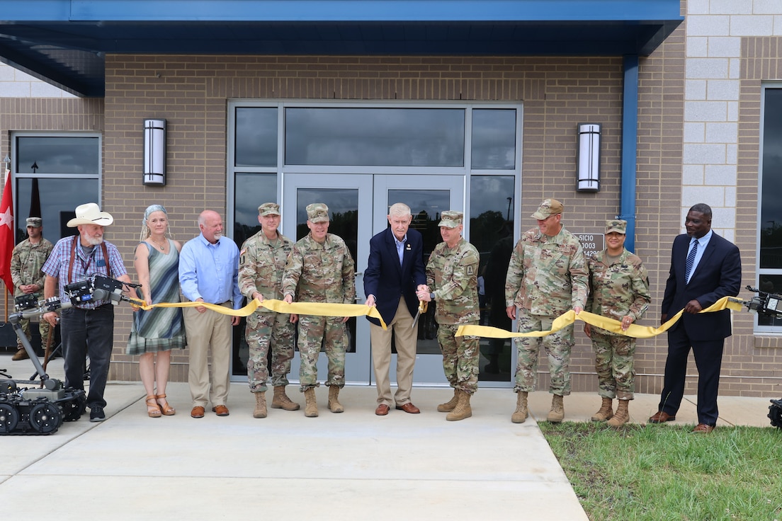 Local and VNG leaders cut a ribbon to officially open the new readiness center