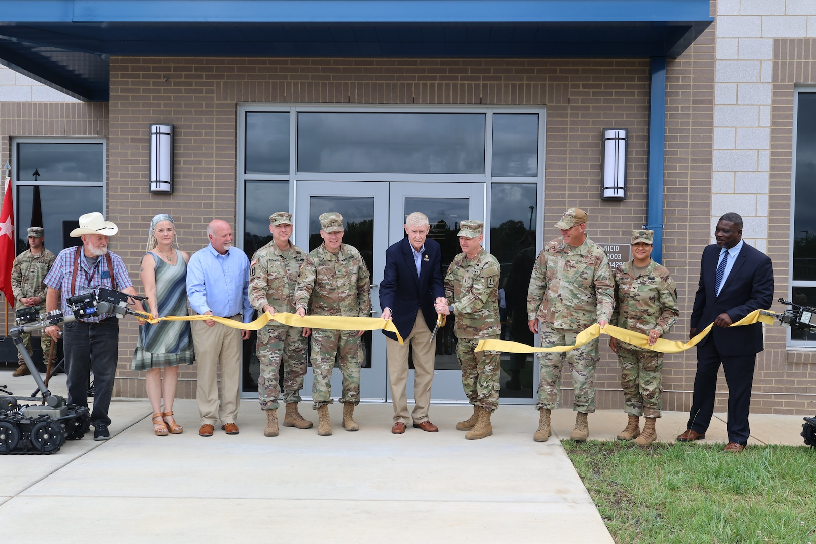 Local and VNG leaders cut a ribbon to officially open the new readiness center