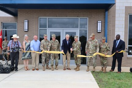 Local and VNG leaders cut a ribbon to officially open the new readiness center