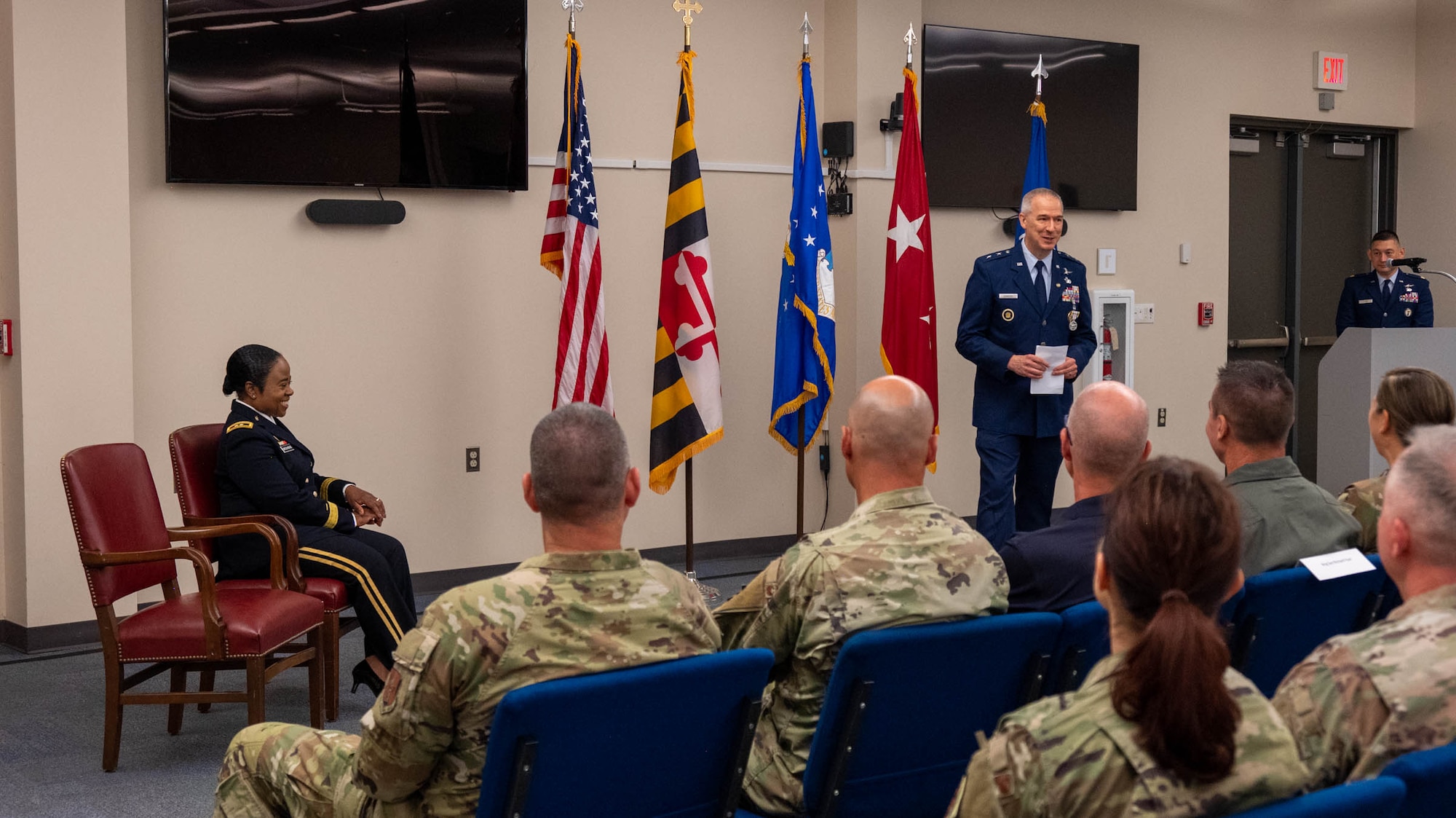 Maryland Air National Guard Maj. Gen. Matthew D. Dinmore,  the National Guard assistant to the commander, U.S. Cyber Command, and director, National Security Agency and Central Security Service, addresses colleagues, family and friends during his retirement ceremony at Warfield Air National Guard Base at Martin State Airport, August 10, 2025. Dinmore served honorably since 1992, retiring with 33 years of service in the United States Air Force. (U.S. Air National Guard photo by Airman 1st Class Sarah Hoover)