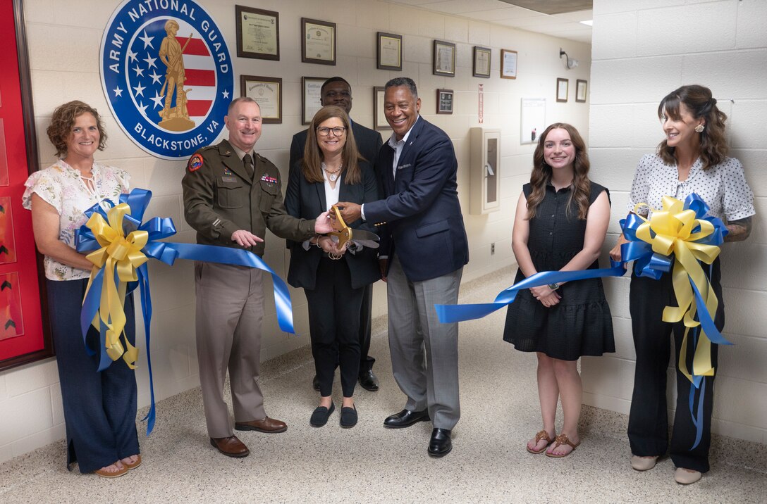 A ribbon is cut to signify the opening of STARBASE Blackstone
