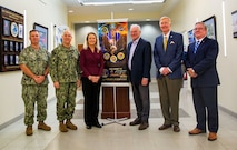 Mr. Michael Durkin, Director of the Navy Warfare Development Center (NWDC), speaks with U.S. Senator Tim Kaine (VA) during his visit to NWDC in Norfolk, Va., on Aug. 4, 2025. Senator Kaine, a member of the Senate Armed Services Committee, received an overview of the Navy’s evolving warfighting concepts and preparations for Large Scale Exercise (LSE) 2025, which will test the Fleet’s ability to conduct integrated, distributed maritime operations across multiple theaters.